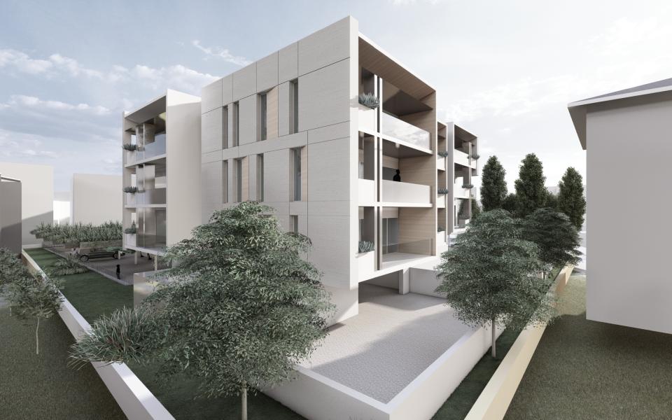 Moderno edificio residenziale con balconi e giardino.